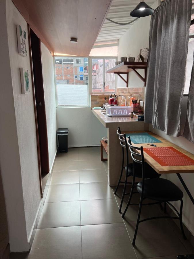 Tiny Apartment In The City Rooftop Terrace Баньос Экстерьер фото